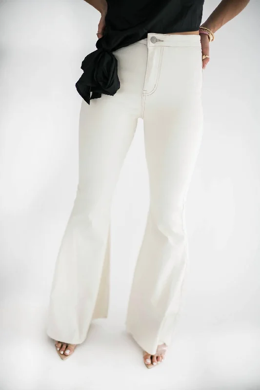 Tight trousers for men with tapered legs and sharp, tailored finish -Logan Flare Jeans In Cream