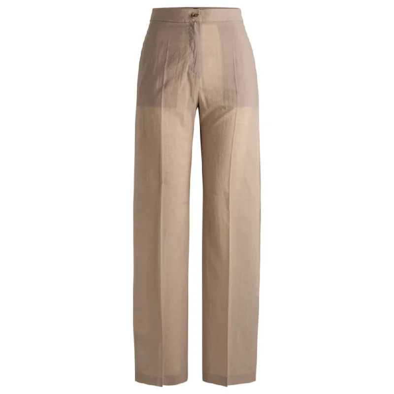 Formal tight trousers for women with sharp crease and sophisticated tailoring -Relaxed-fit trousers