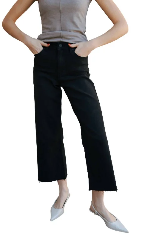 Black leather tight trousers for women with sleek, glossy finish for night out -Slim Wide Leg Jean In Black