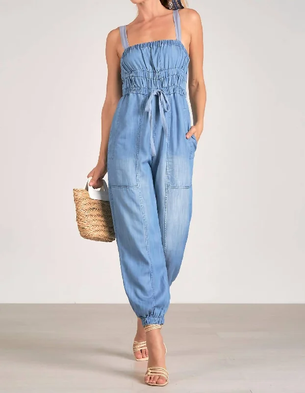 Tight trousers for women with leather accents and modern, bold design -Melissa Jumpsuit In Light Blue