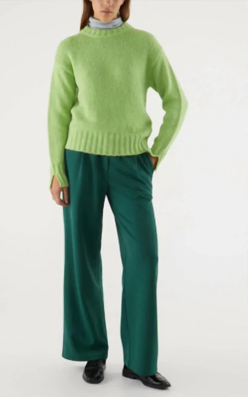 All-black tight trousers for women with simple, chic design for formal occasions -Pleated Trouser In Green