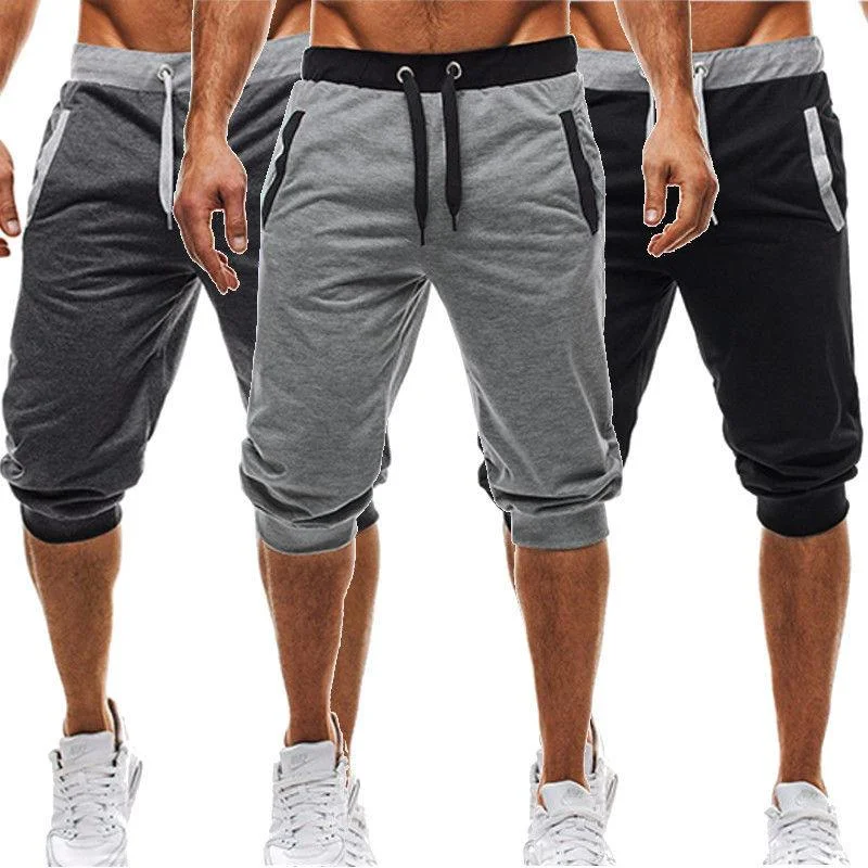 Trendy patterned shorts for women with floral prints for a chic summer look-Summer 3' and '4 Trouser Shorts Fitness Clothing for Bodybuilding Men