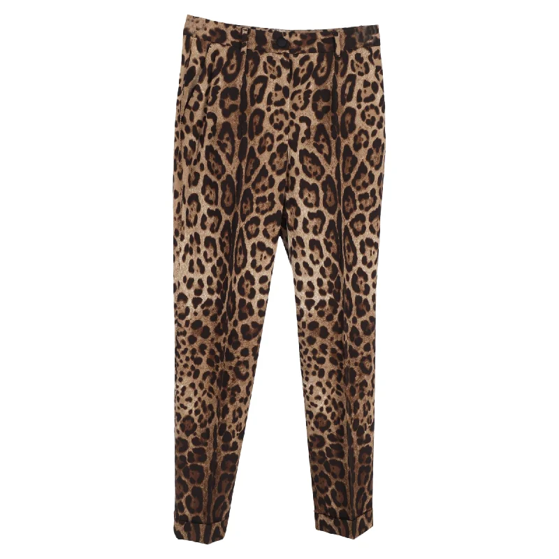 Sleek tight trousers for men with black color and slim, sharp cut -Dolce & Gabbana Slim-Cut Trousers in Animal Print  Cotton