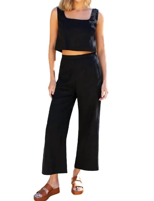 Vintage-inspired tight trousers for women with buttoned waist and retro charm -Roma Pant In Black Linen