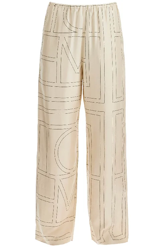 Boho-inspired tight trousers for women with earthy tones and relaxed fit -Toteme Women's Monogram Silk Pajama Pants