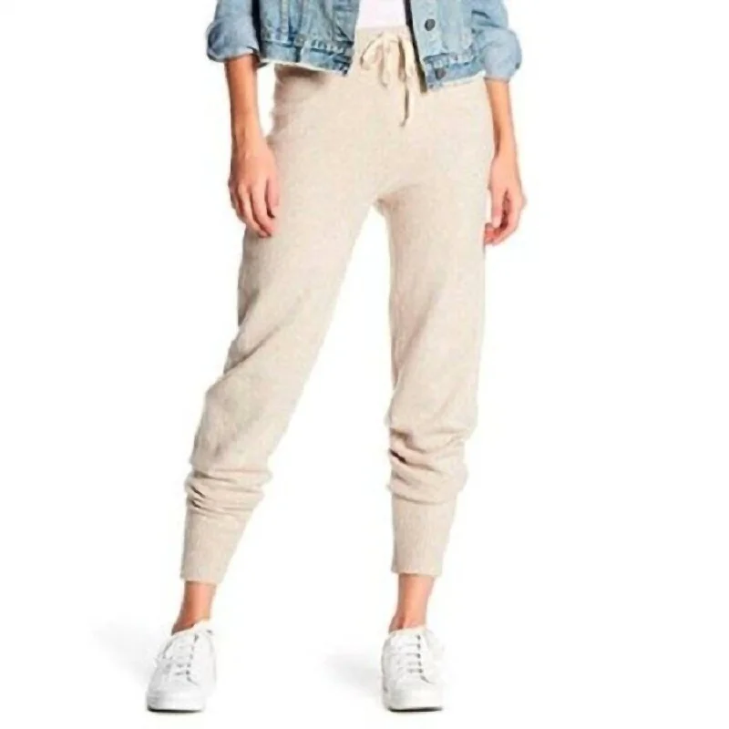 Stretchy knit tight trousers for women with soft fabric and relaxed fit -Knit Drawstring Jogger Pants In Cream