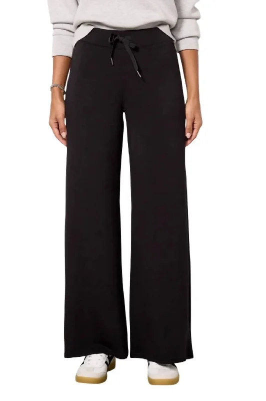 High-waisted tight trousers for women with elastic waistband for added comfort -Airessentials Wide Leg Pant In Black