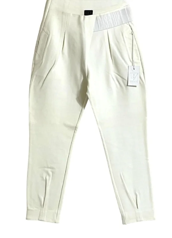 Stretch tight trousers for women with deep waistband for extra comfort and fit -Women's Ali Pleated Front Jogger Pants In Ivory